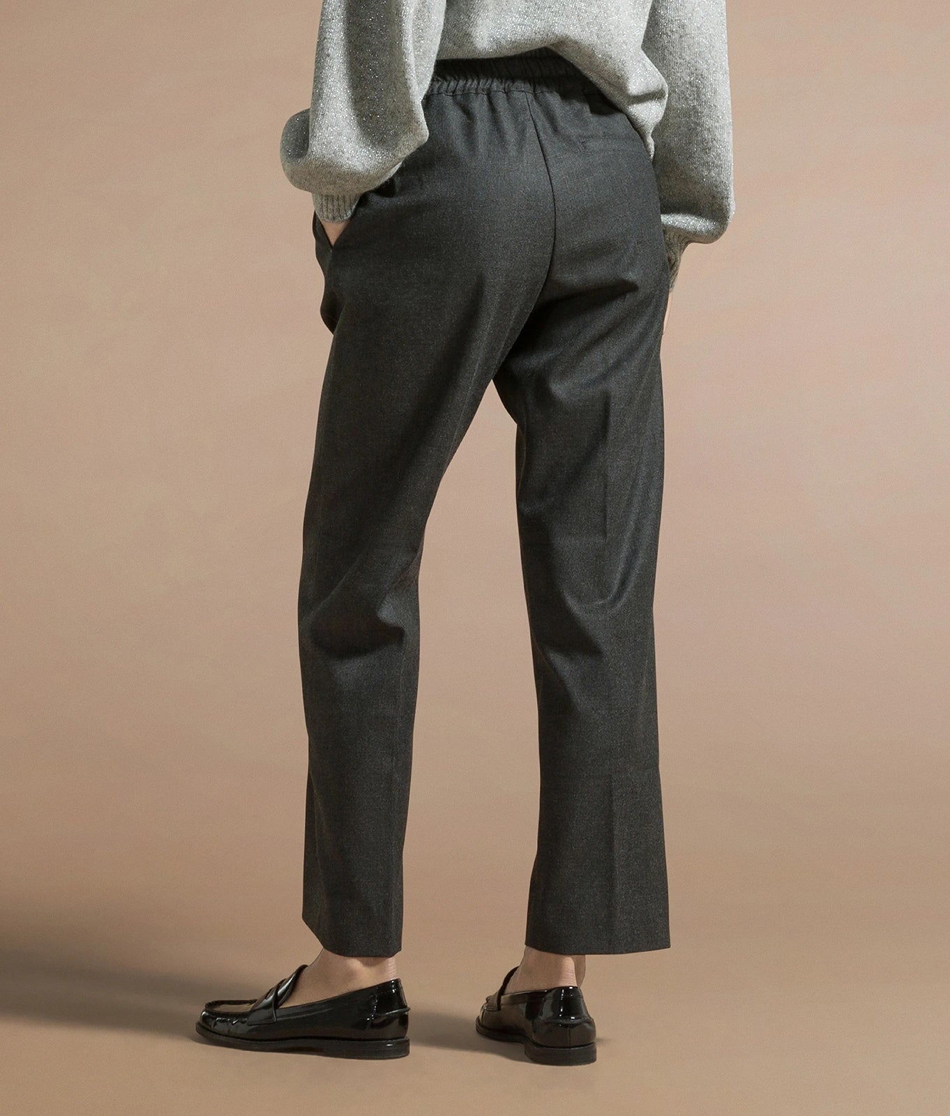Loose fit trousers with elasticated waistband and coulisse in